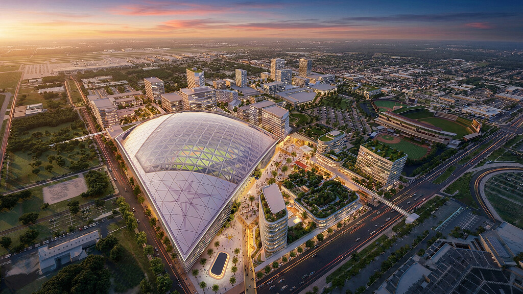 A large stadium with a large glass roof.